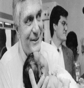 Former Governor Lawton Chiles holds up a 2-day old baby in 1992, signaling the beginning of Healthy Start.
